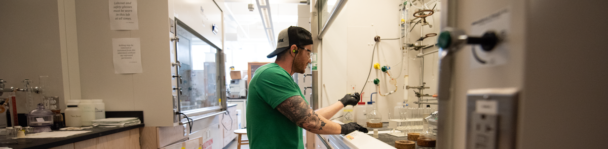 Graduate student in lab for aesthetic purposes