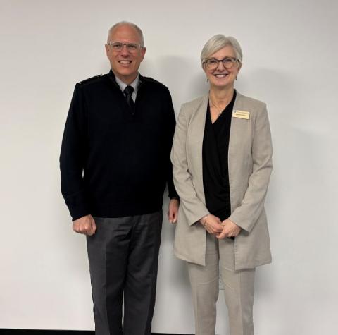 President of UNH standing with Lieutenant General Philip A. Garrant