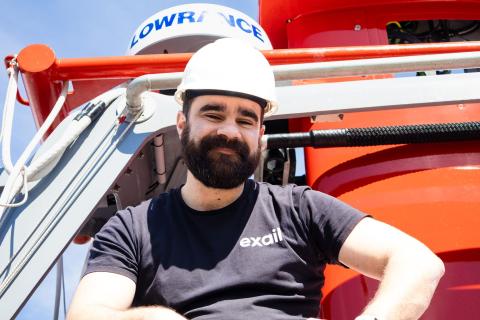 Exail Employee Smiling on Surface Vessel