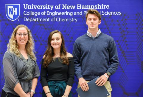 Prof. Christine Caputo presents the George & Dorothy Costarakis Galanes Scholarship to Amina Gusic and James Wilkes