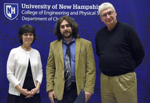 Prof. Emeritus Gary Weisman and Mrs. Jean West present Brian Patenaude with the Craig A. West Memorial Award