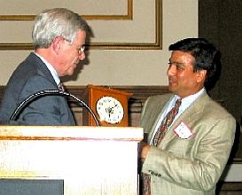 Rajiv Parikh receiving an award